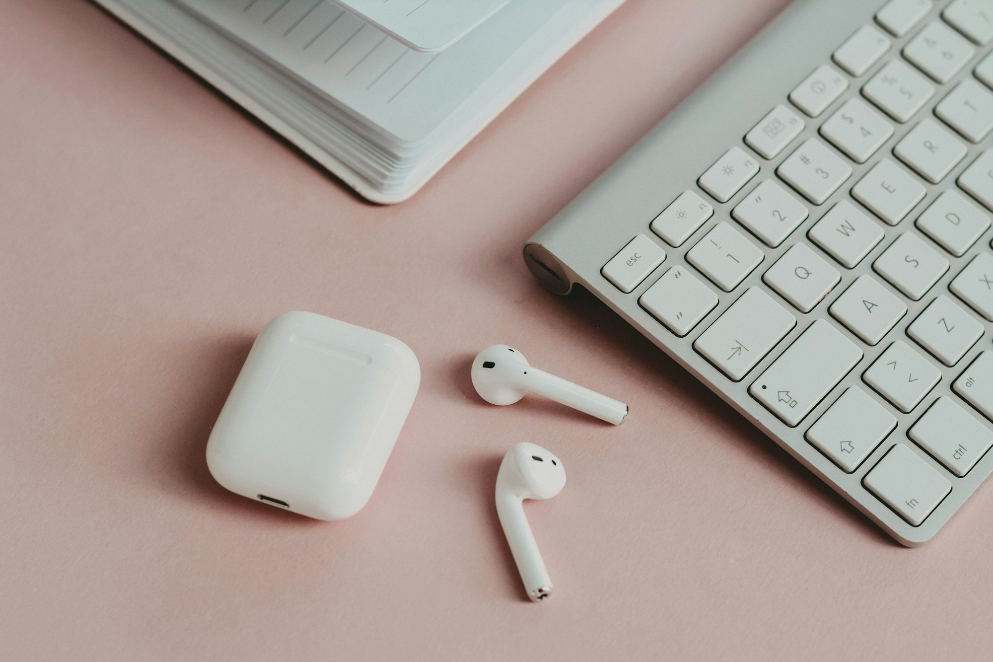 Air pods on pink ✦ Snag more FREE stock photos each month 👉 https://contentpixie.com/secret-snaps/