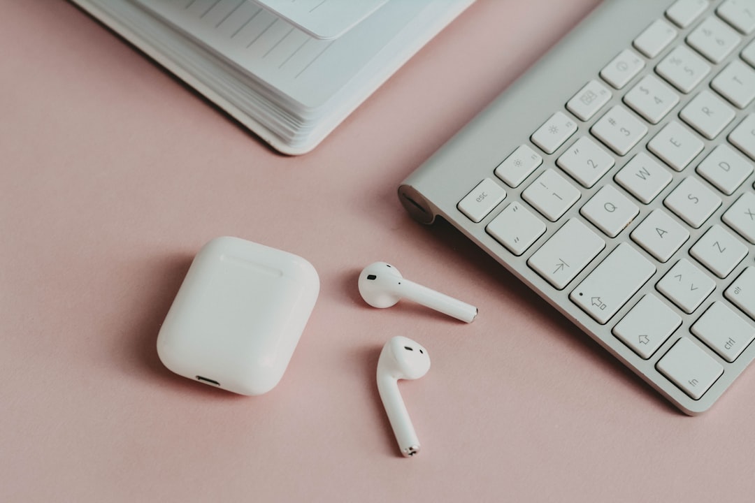 apple magic mouse on white desk, Air pods on pink ✦ Snag more FREE stock photos each month 👉 https://contentpixie.com/se