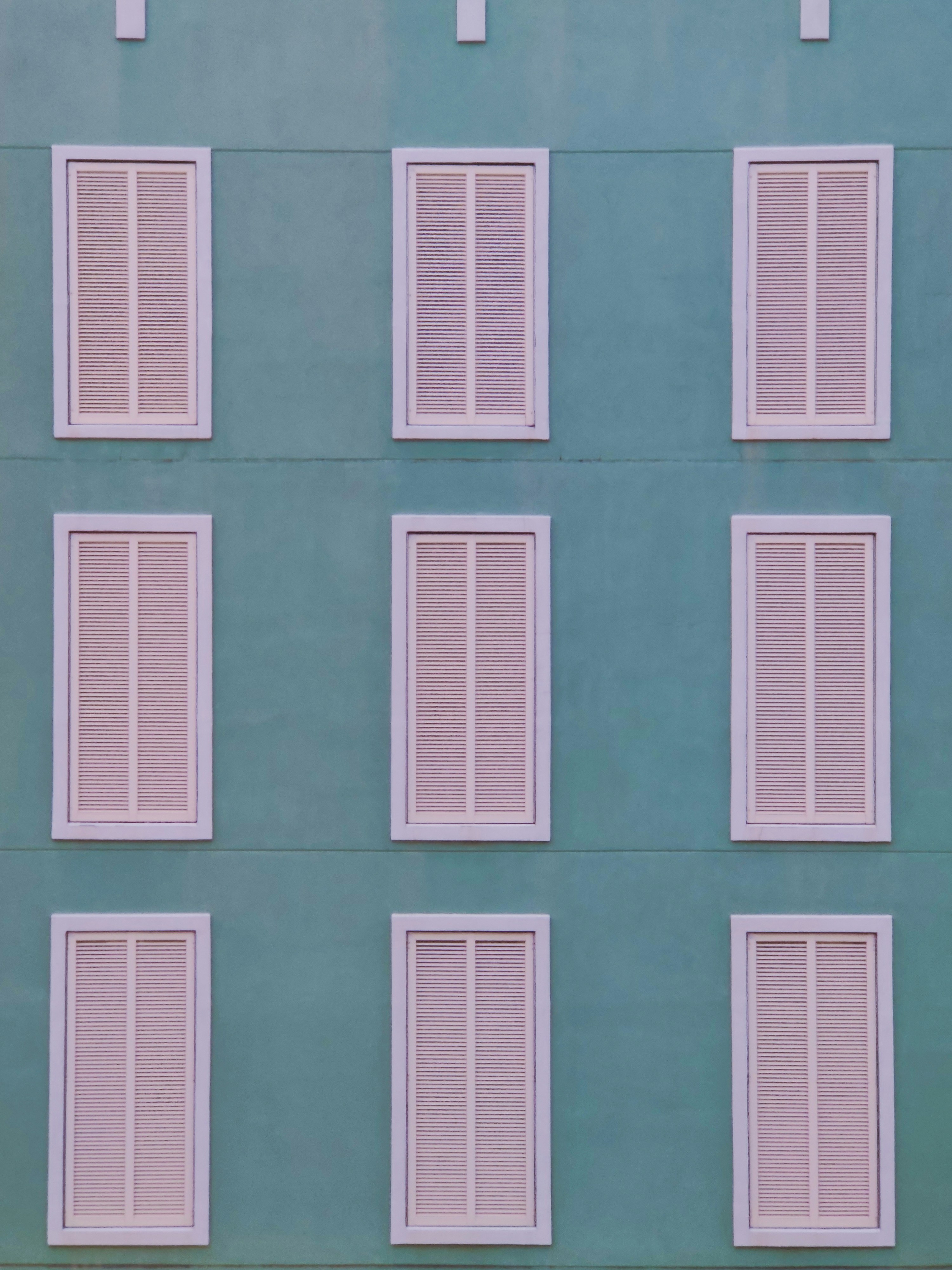 teal and white concrete building