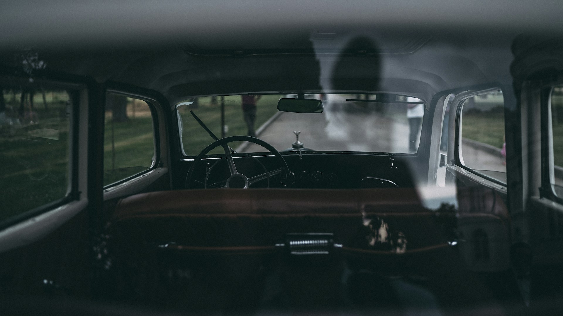 black car with open door