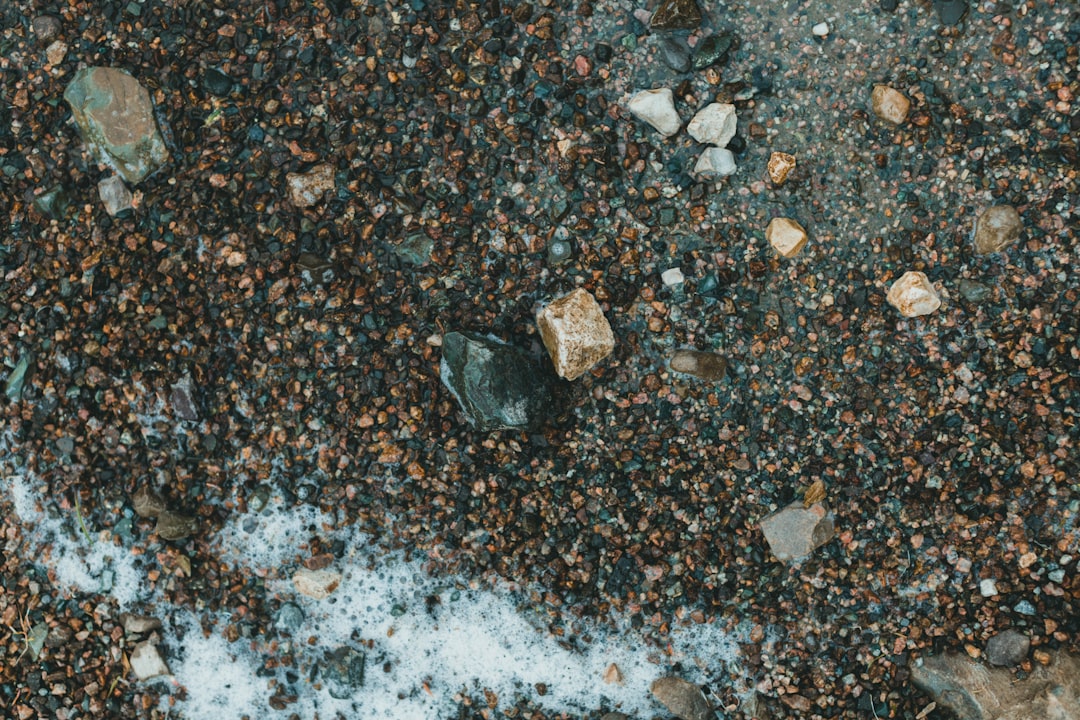 black and gray stone on gray and black marble surface