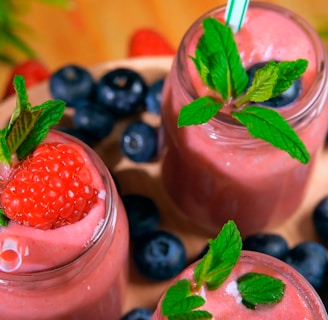 strawberry shake on clear drinking glass