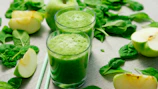 green liquid in clear drinking glass