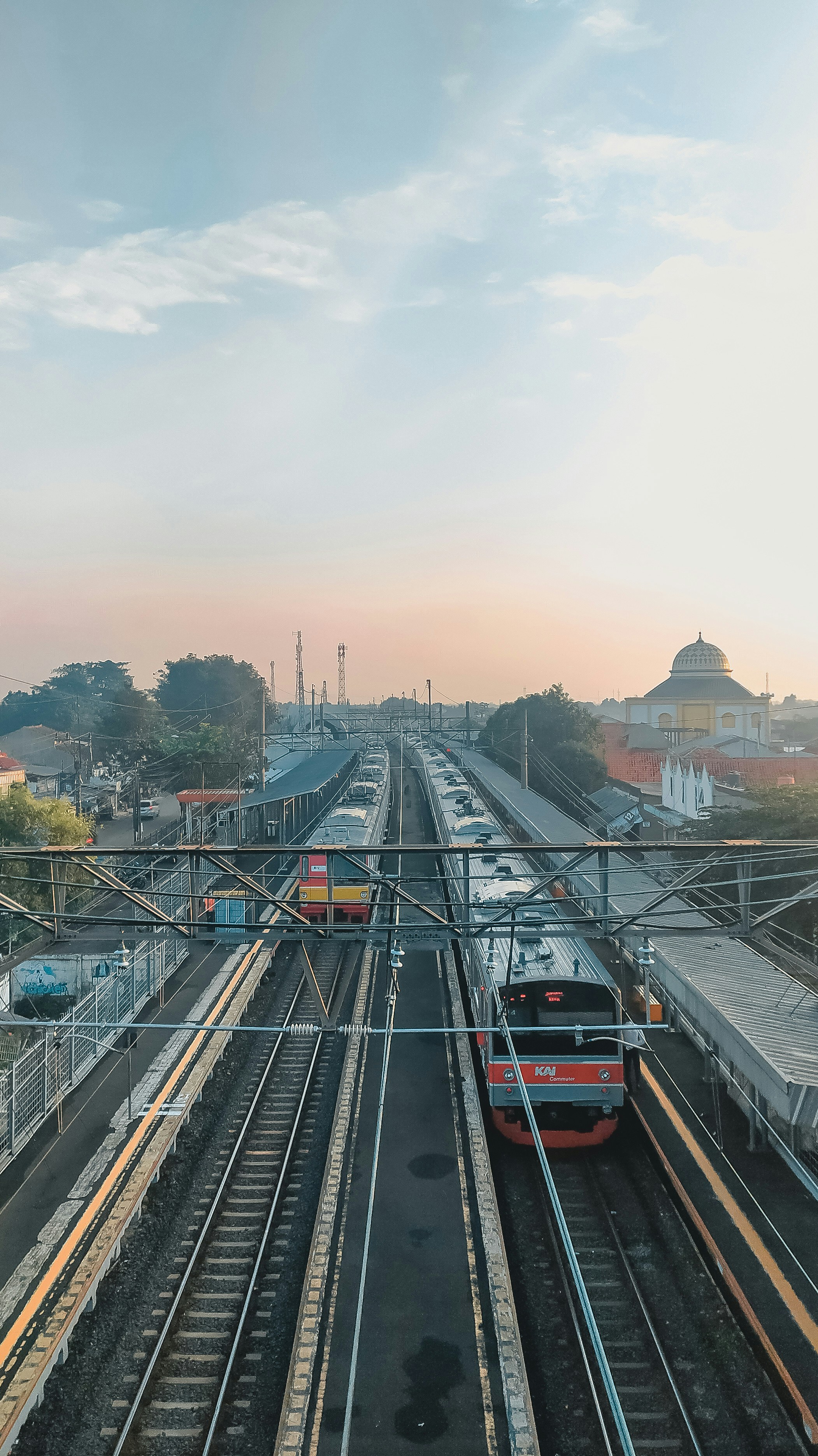 red and black train on rail during daytime