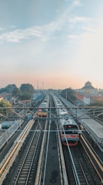red and black train on rail during daytime