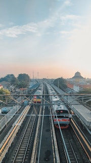 red and black train on rail during daytime