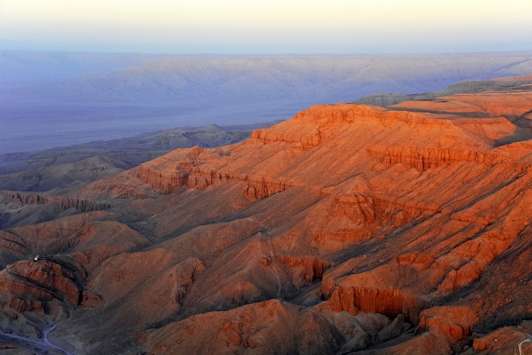 brown mountains under white sky during daytime