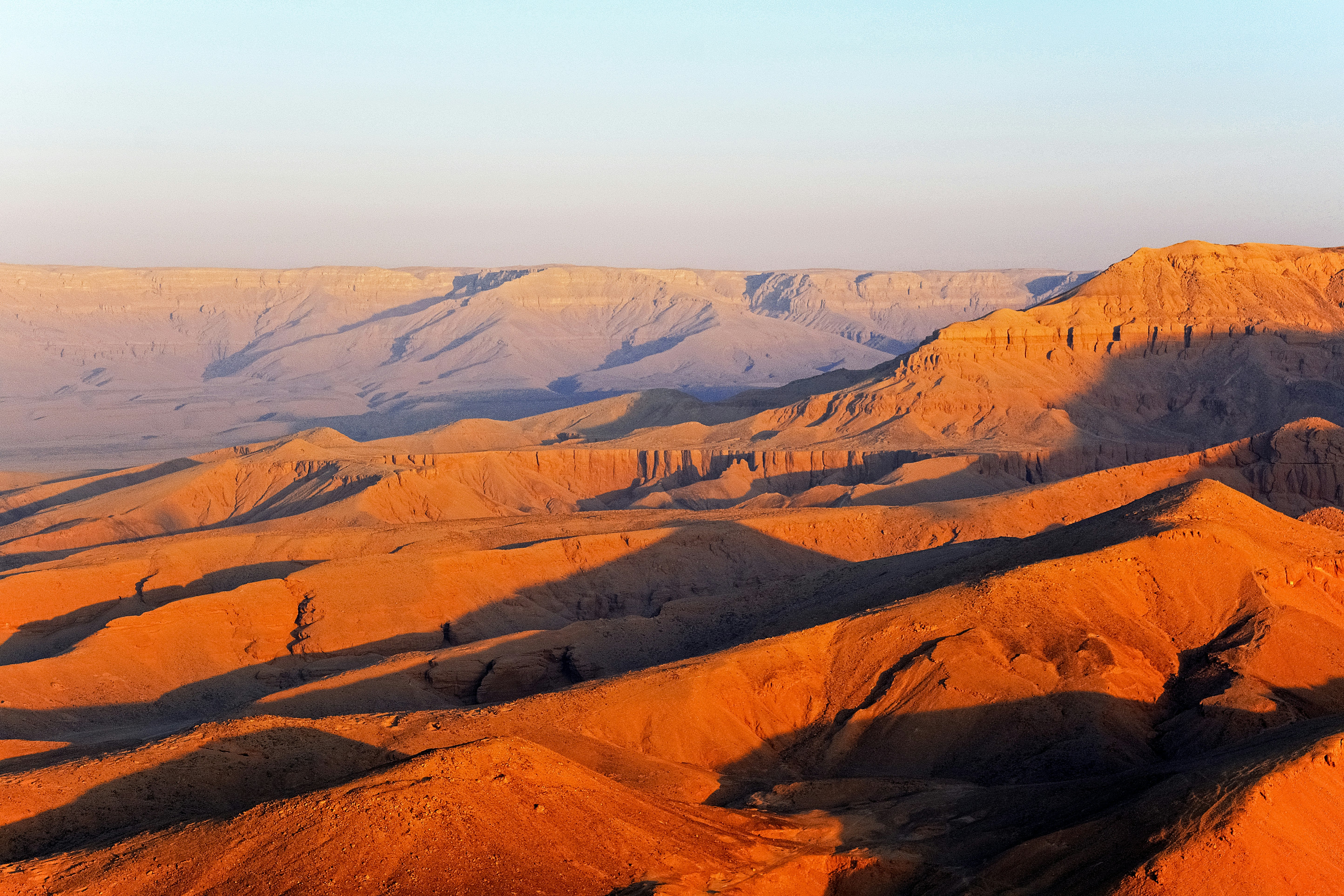 brown and gray mountains under white sky during daytime