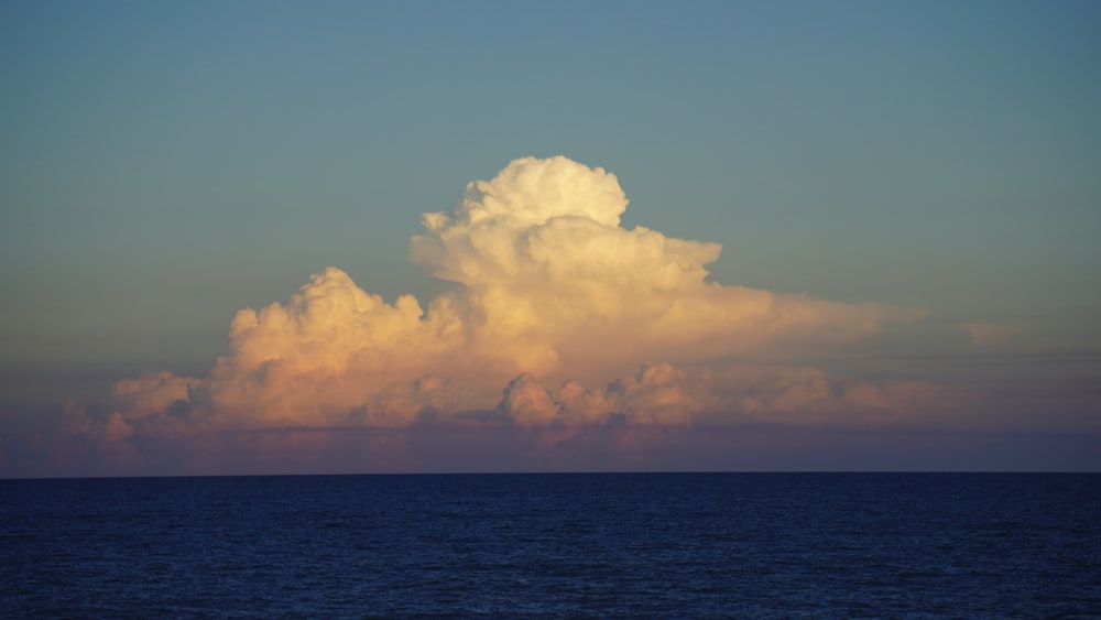 white clouds over blue sea during daytime