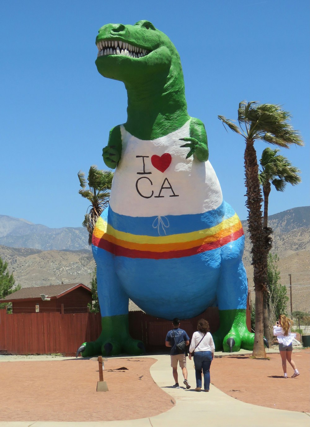 green blue and yellow animal statue