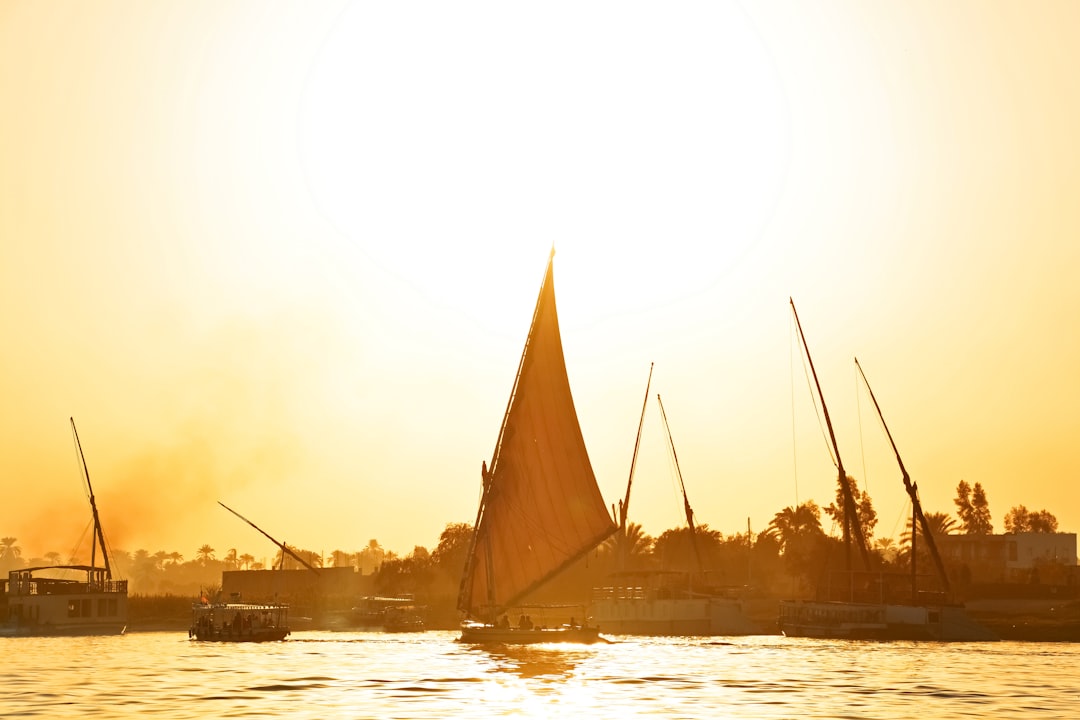 sail boat on body of water during daytime