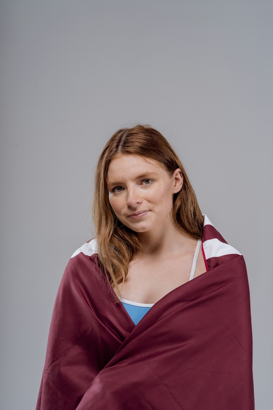 woman in red and white shirt