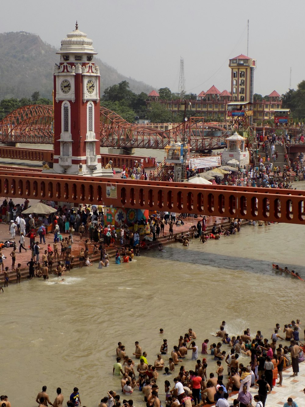 people walking on bridge during daytime