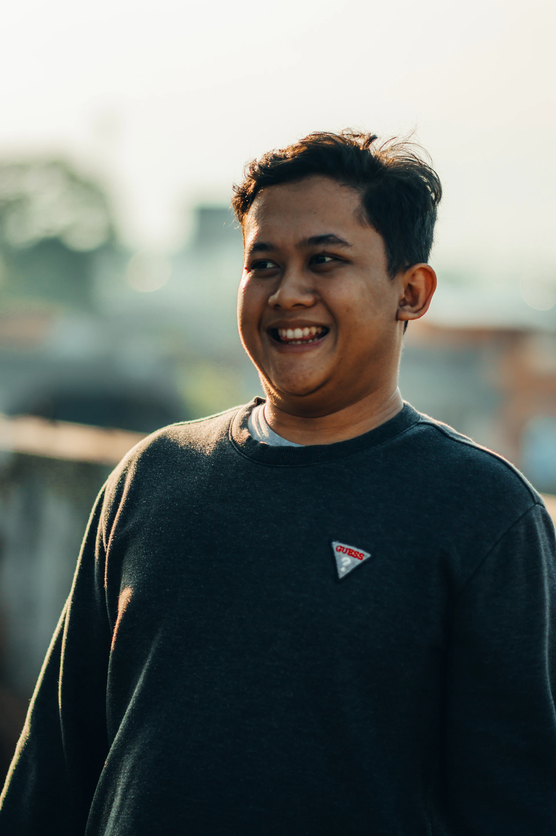 person wearing grey knit sweater