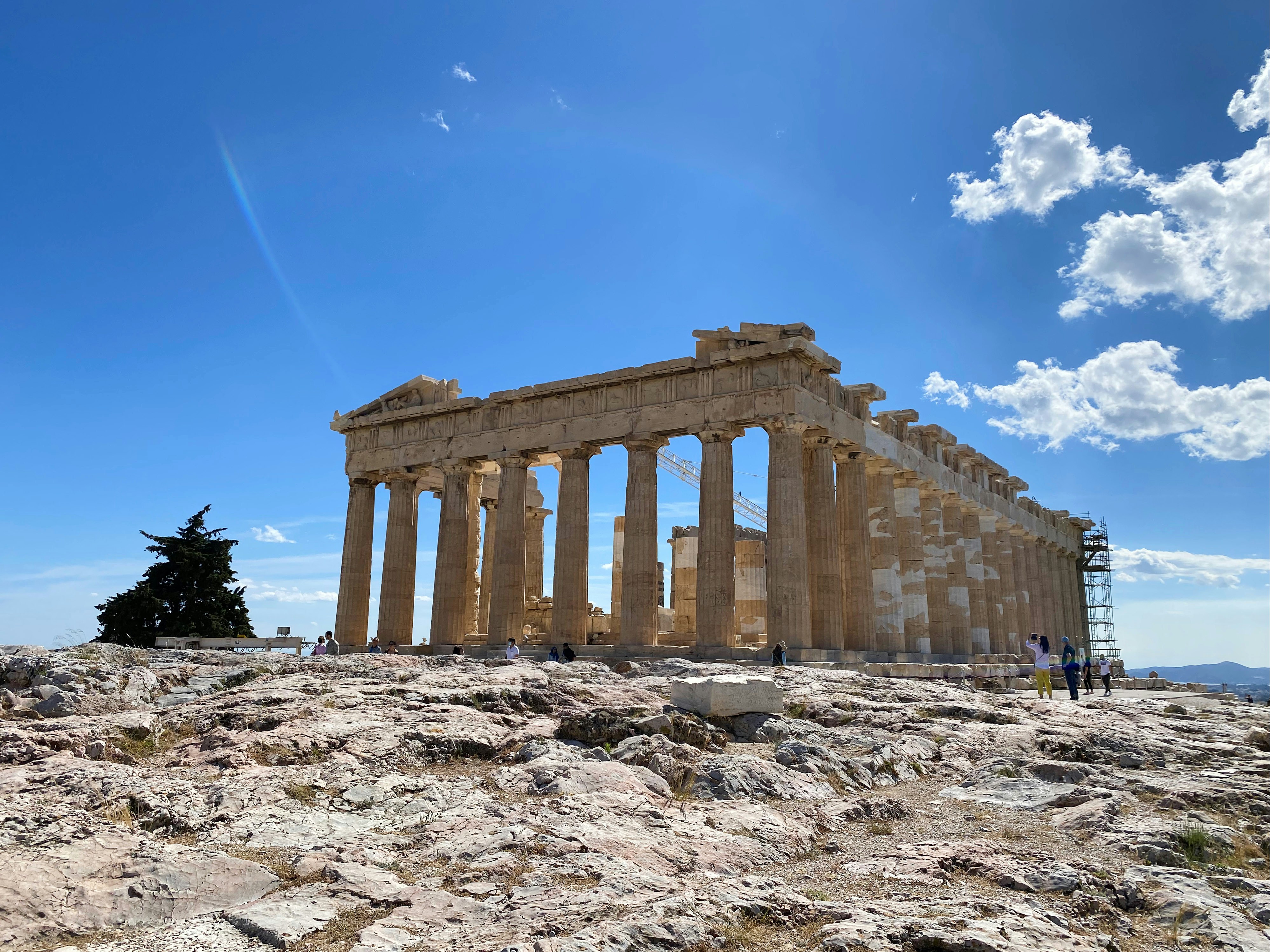 brown concrete building under blue sky during daytime, The spectacular ruins of Attica, Athens in Greece.