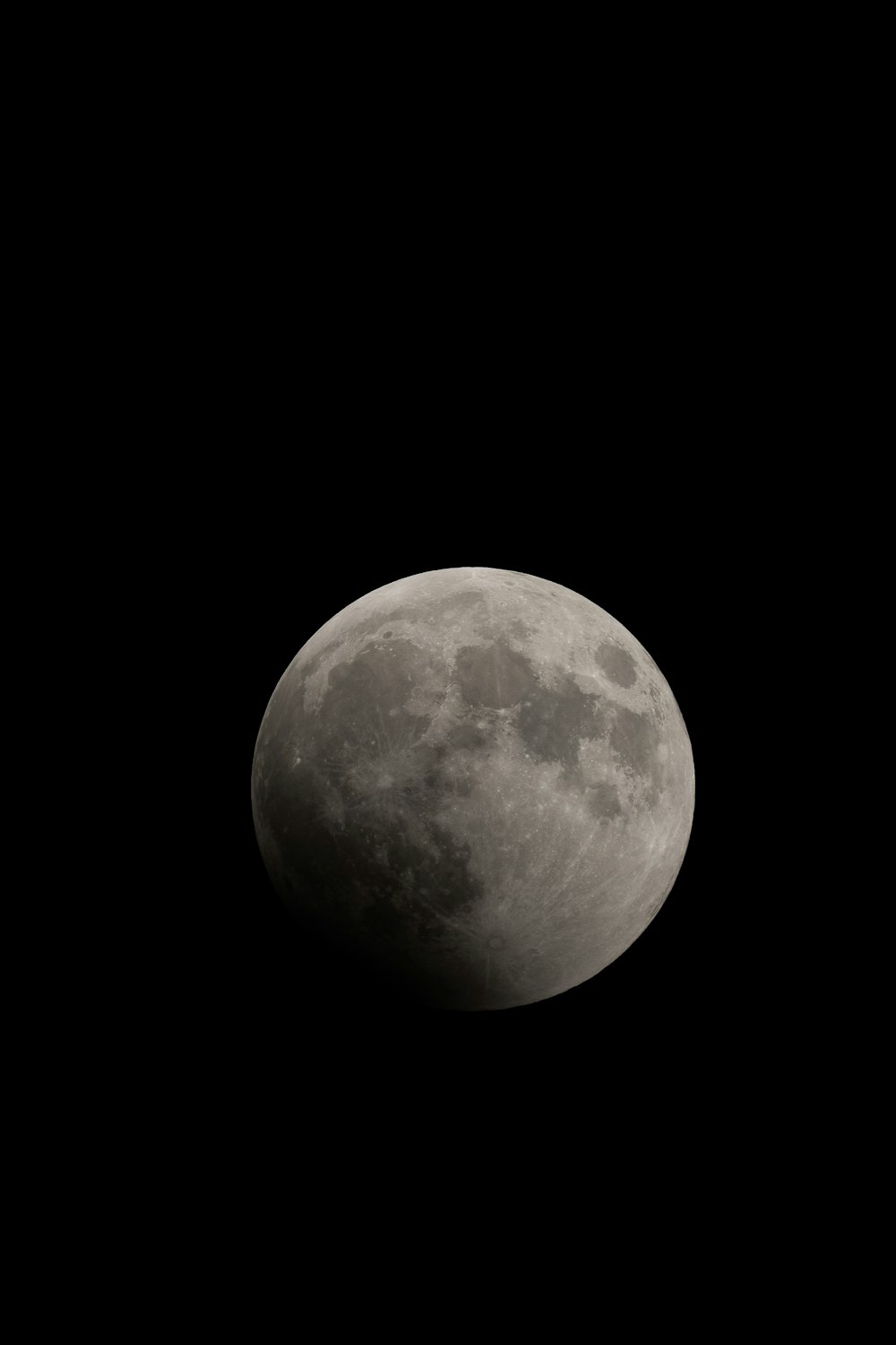 full moon in dark night sky