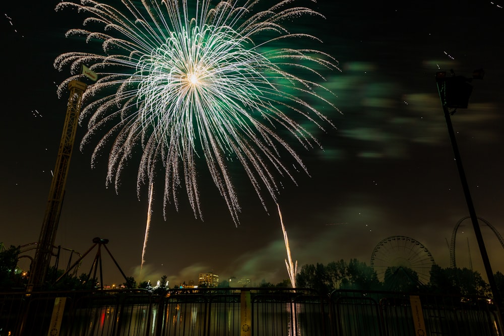 fireworks display over city during night time