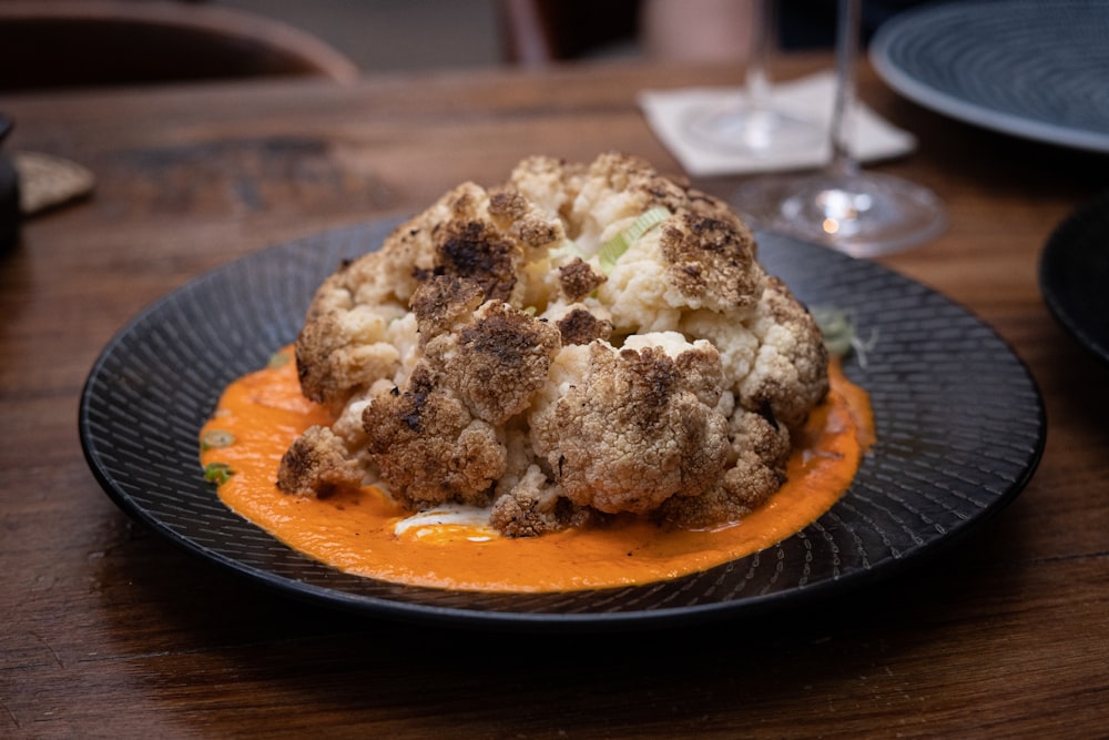 brown and white food on blue ceramic plate