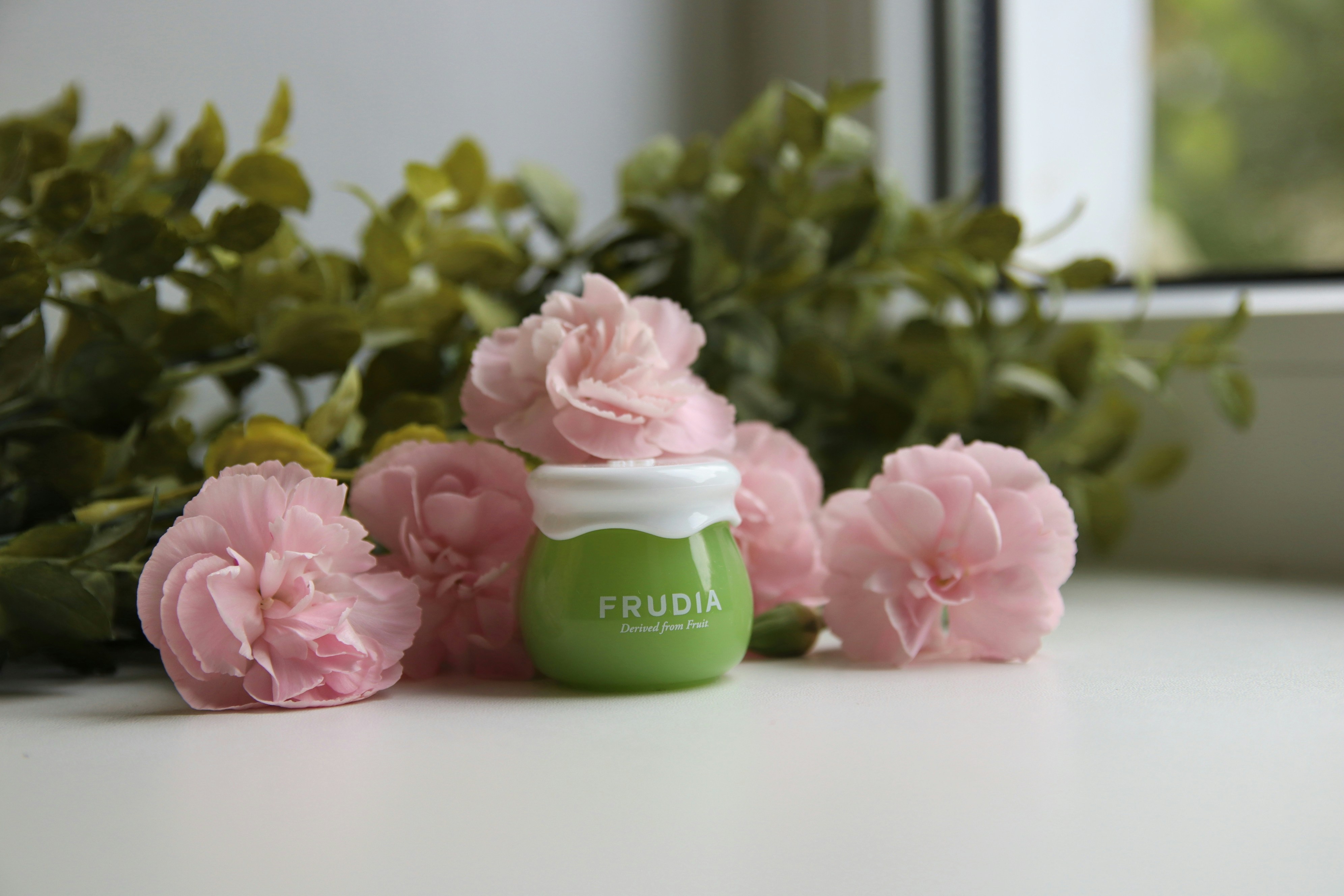 pink roses on white table