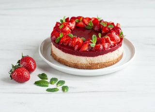 strawberry cake on white ceramic plate