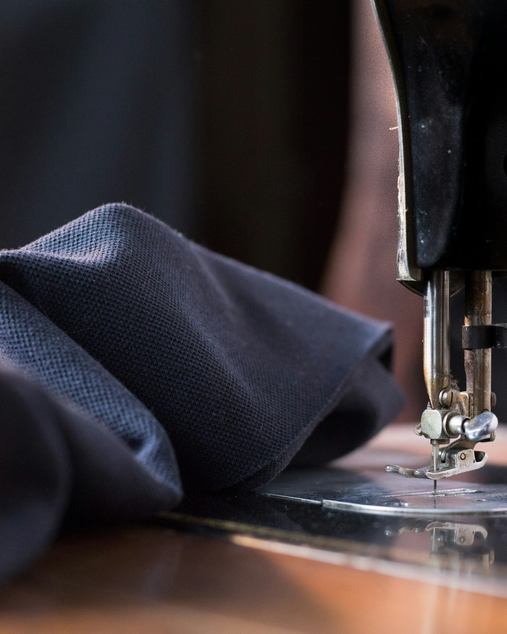 blue textile on brown wooden table