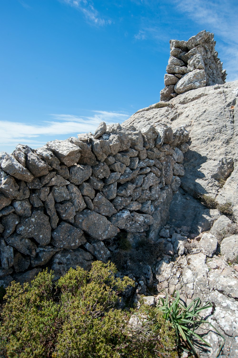 gray rock formation under blue sky during daytime