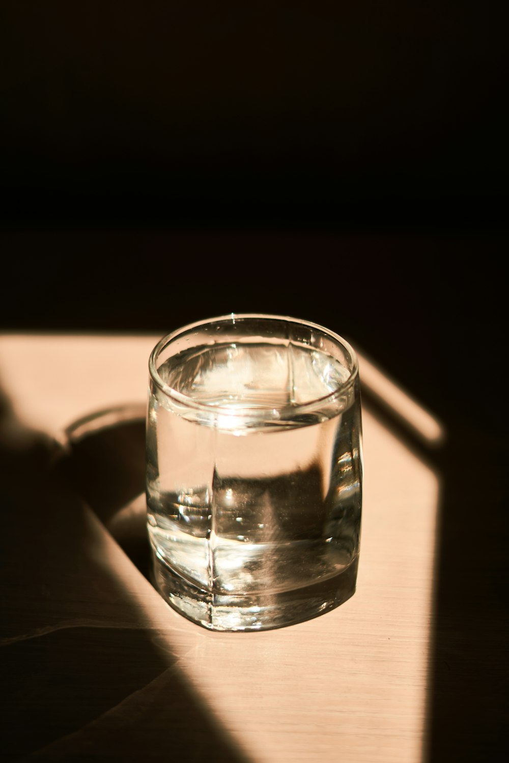 clear drinking glass with water