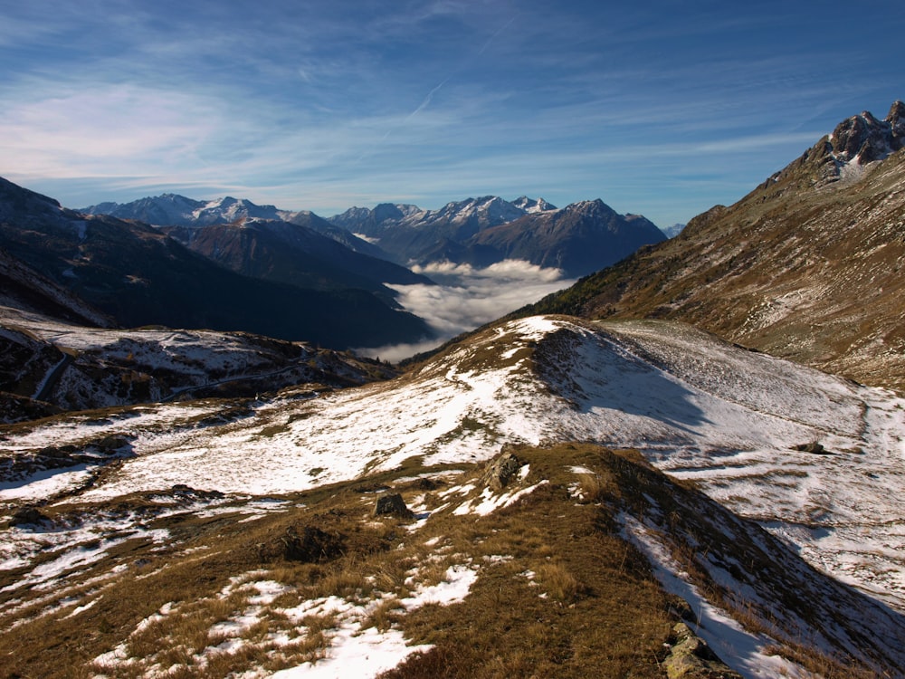 snow covered mountain under blue sky during daytime