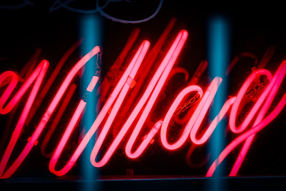 red and white open neon signage