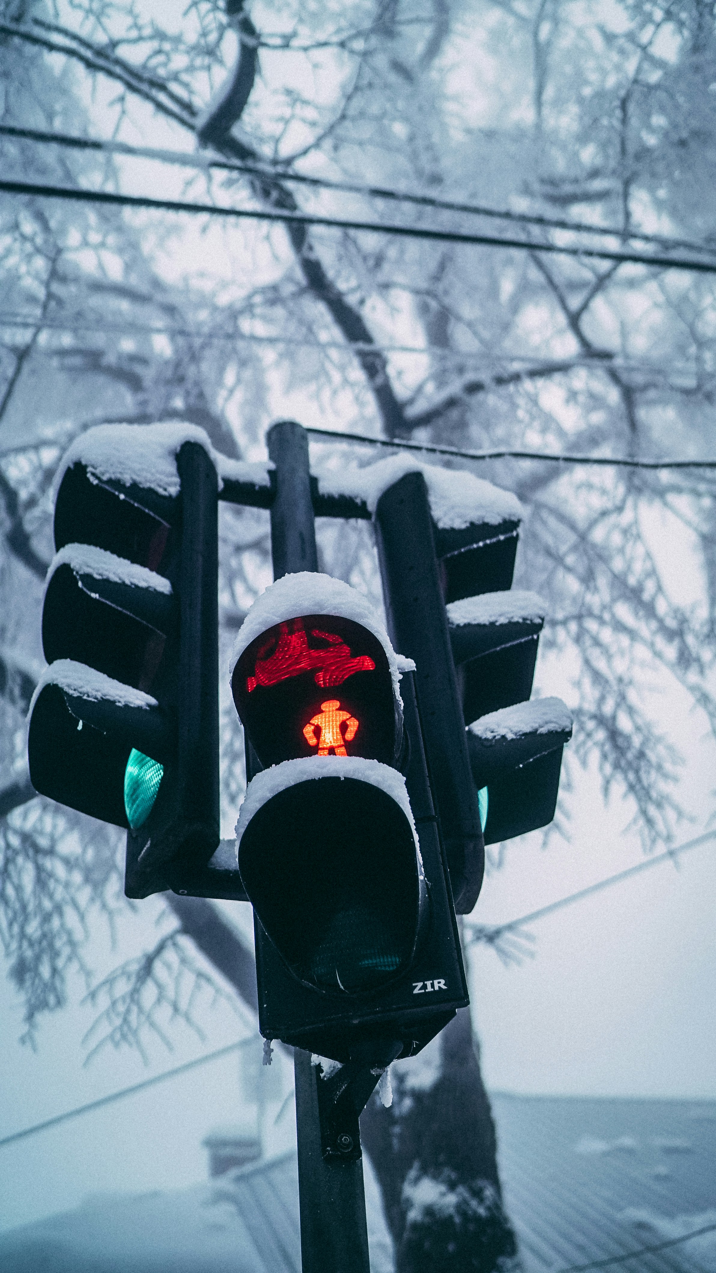 black traffic light with red light