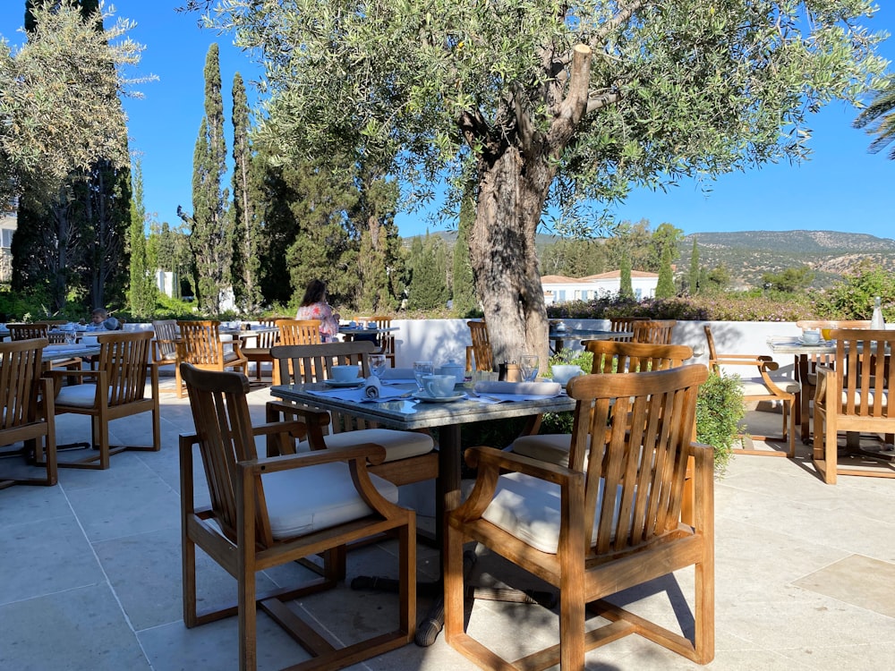 brown wooden table and chairs