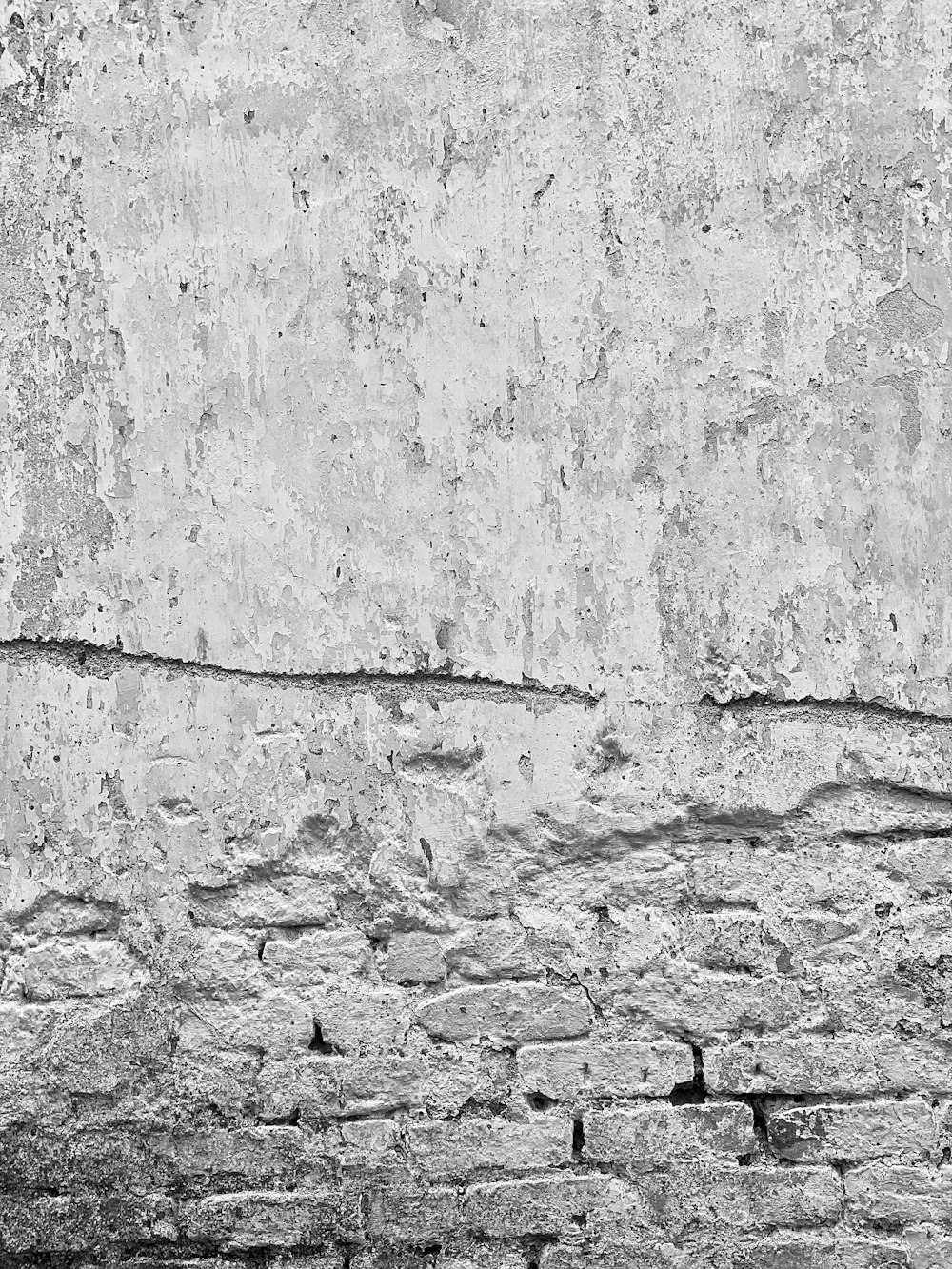 grayscale photo of concrete wall