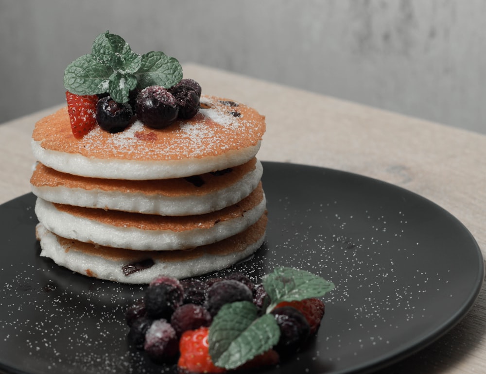 brown and white cake with strawberry on top