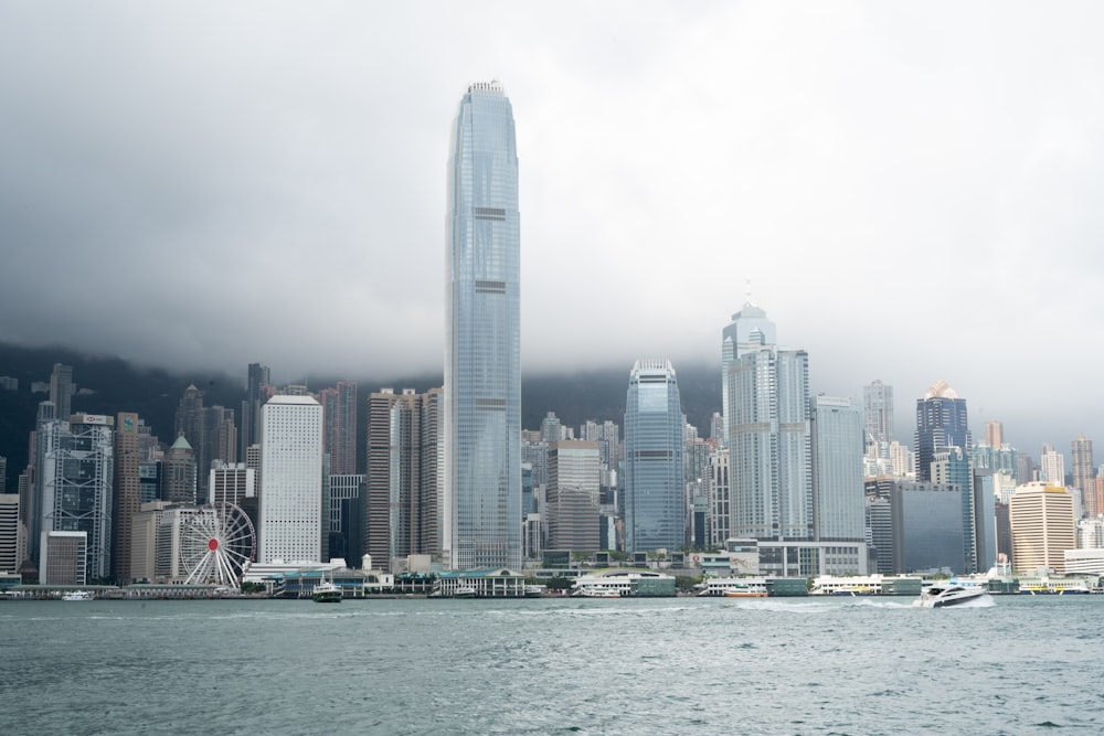 city skyline across body of water during daytime