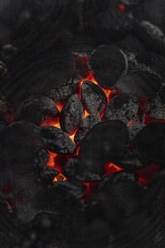 black and red stones on black soil