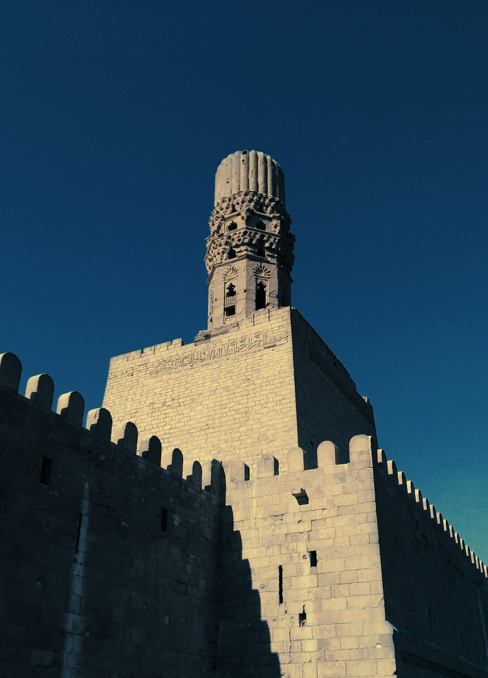 brown concrete building under blue sky during daytime