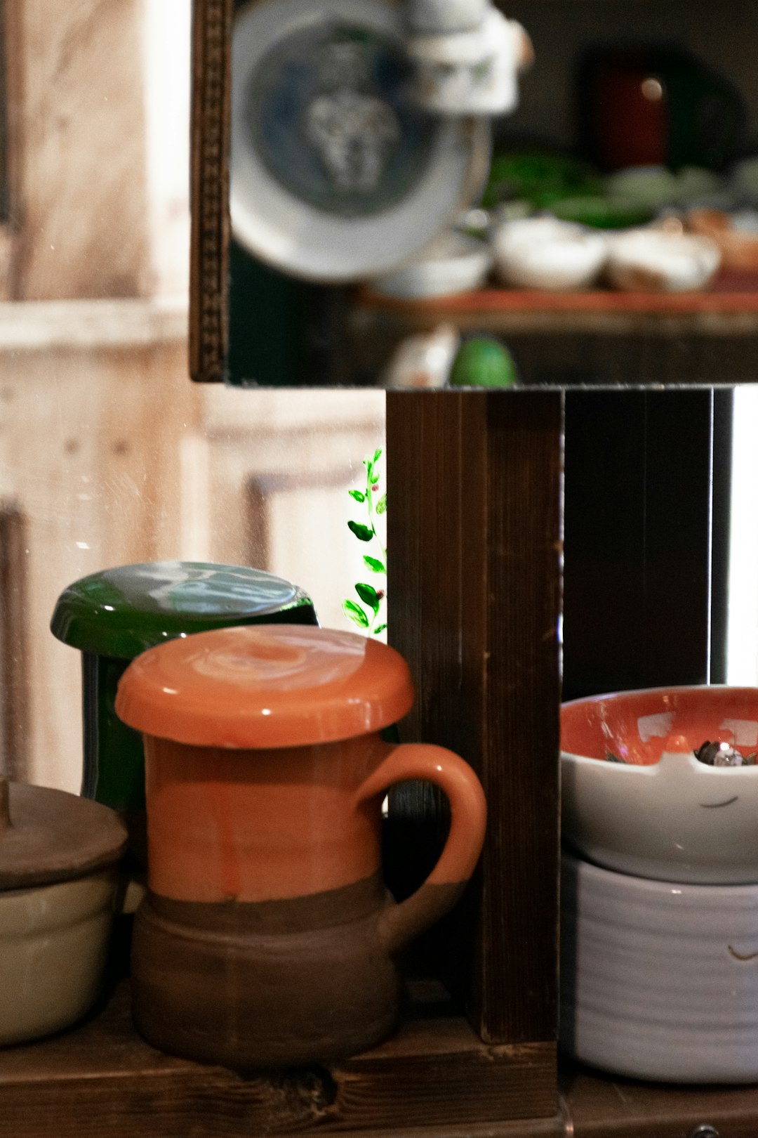 brown ceramic mug on brown wooden table