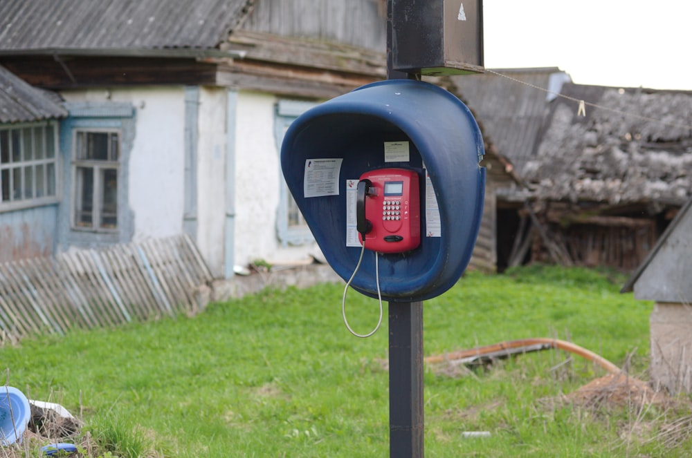 blue and black telephone booth