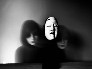 grayscale photo of man and woman