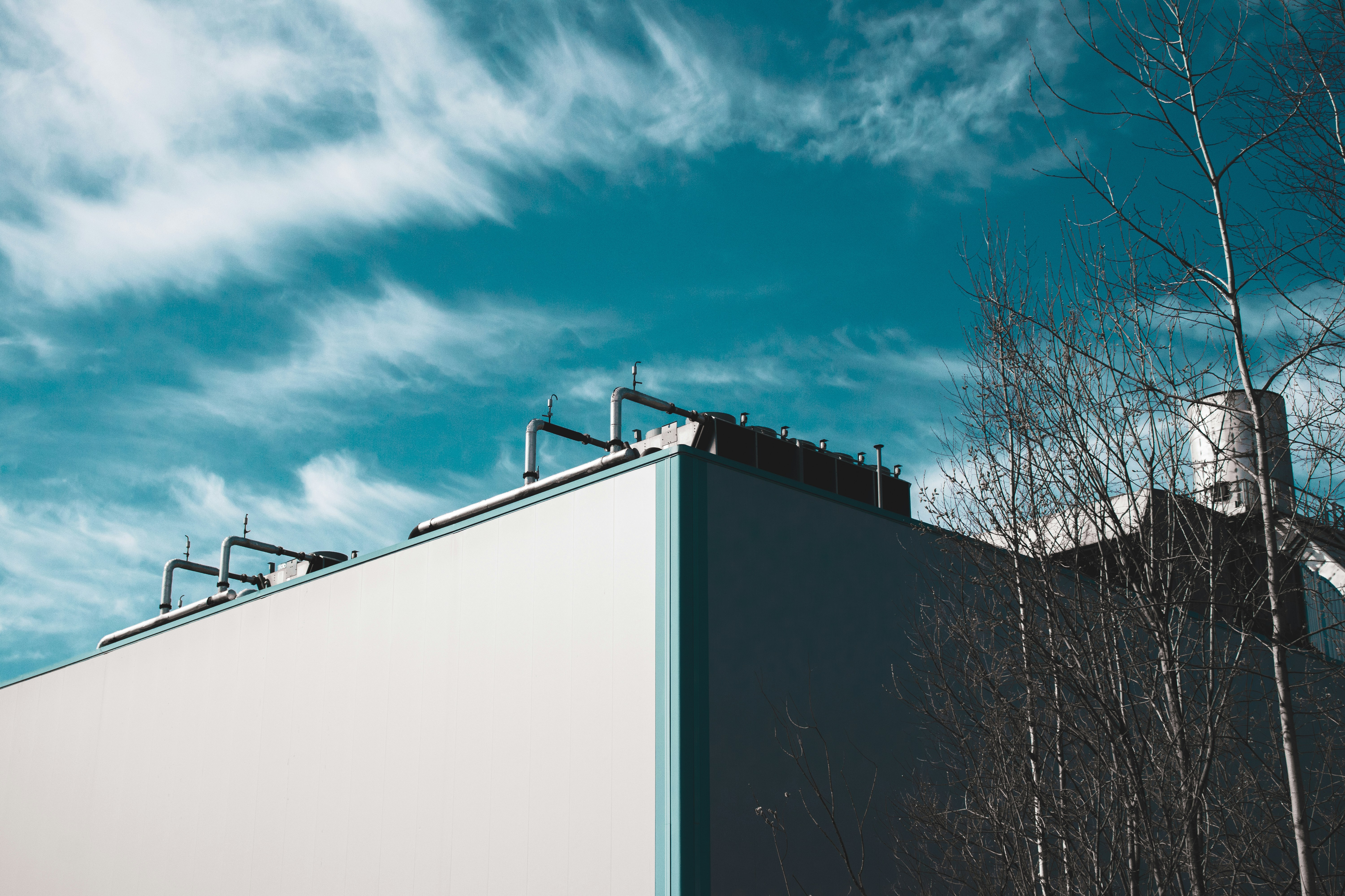 white concrete building under blue sky during daytime