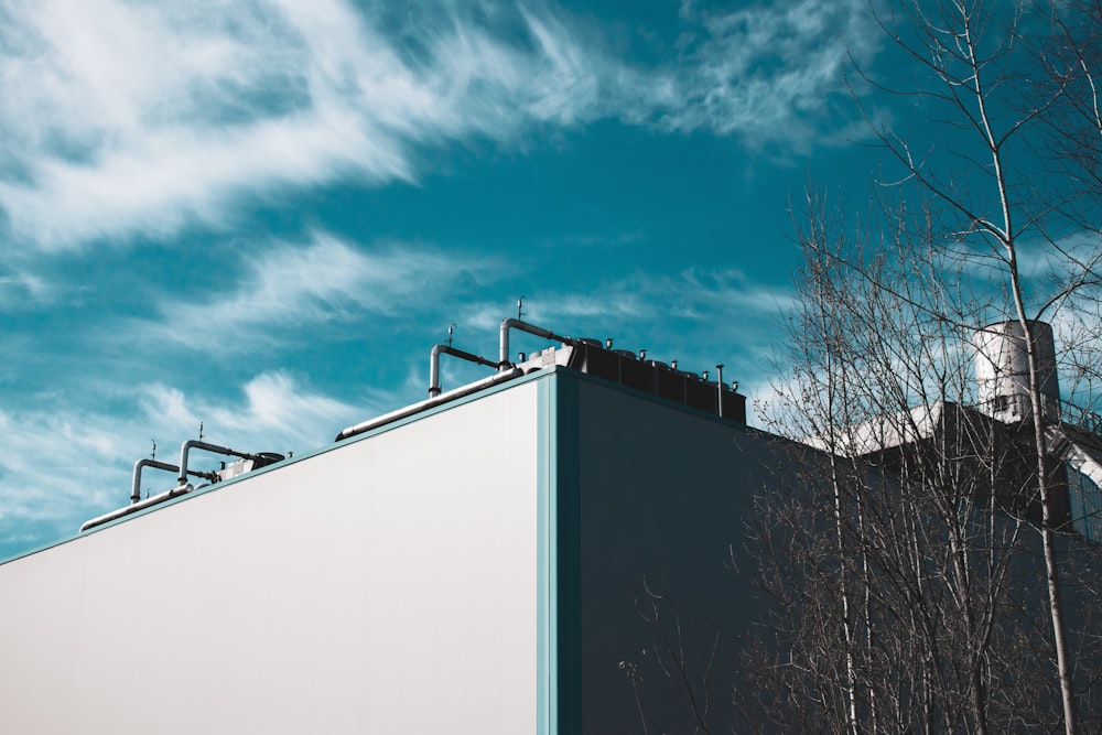 white concrete building under blue sky during daytime