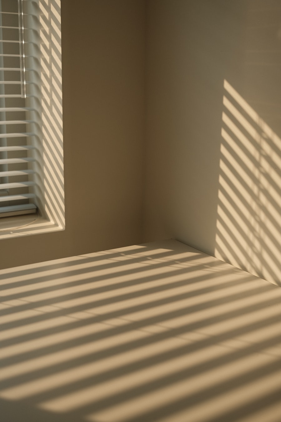 Afternoon sunlight coming through window shades — photo by Minha Baek on Unsplash
