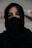woman in black hijab taking selfie