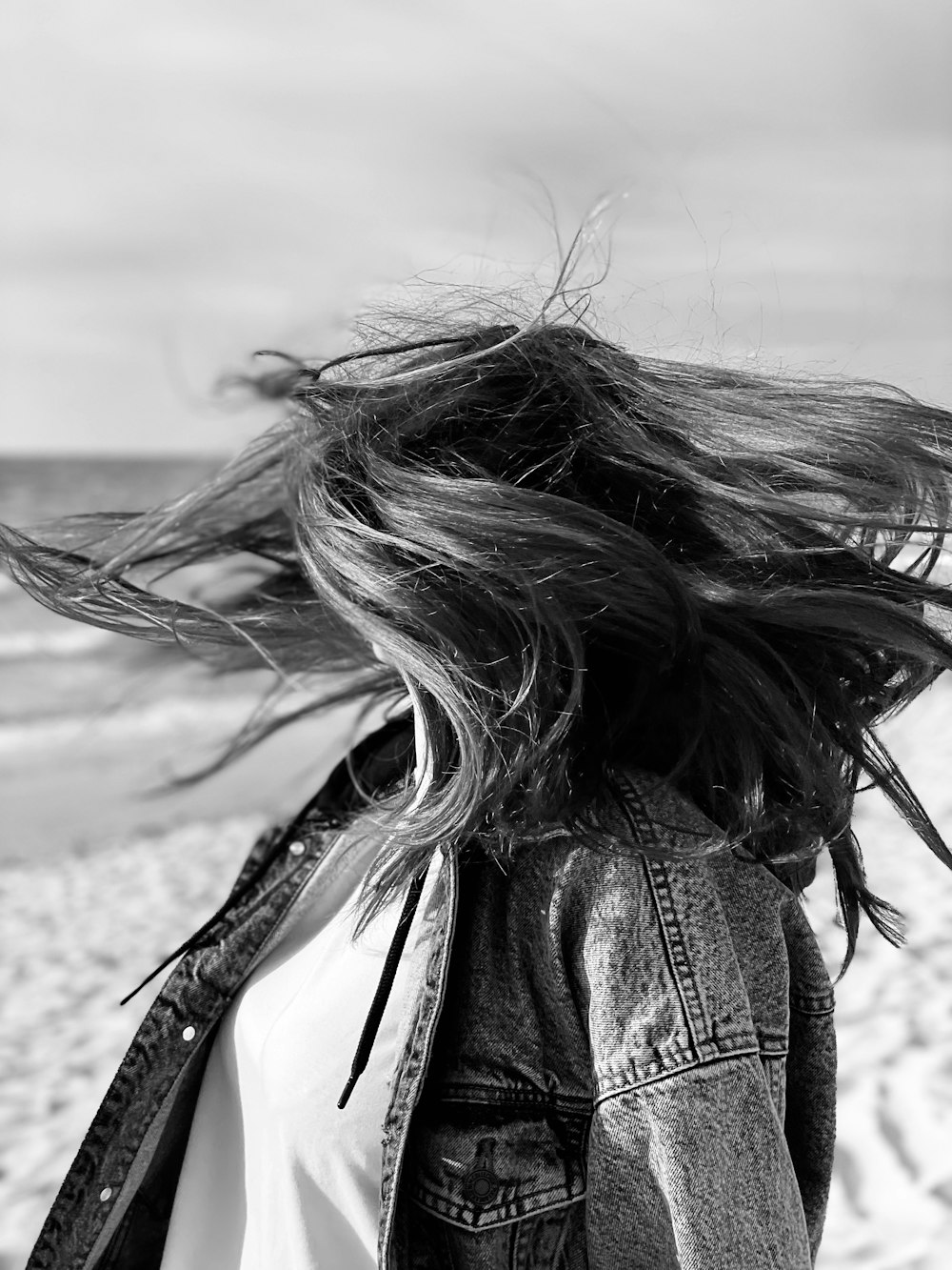 grayscale photo of woman in black jacket