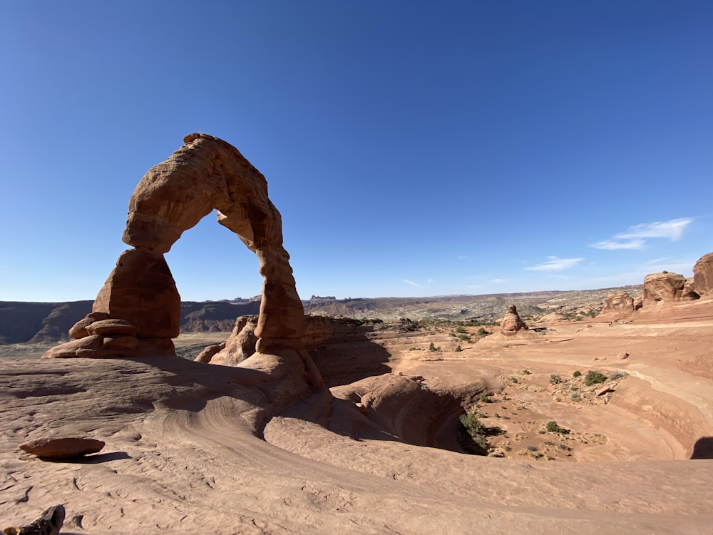 brown rock formation under blue sky during daytime