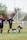 2 men playing soccer during daytime