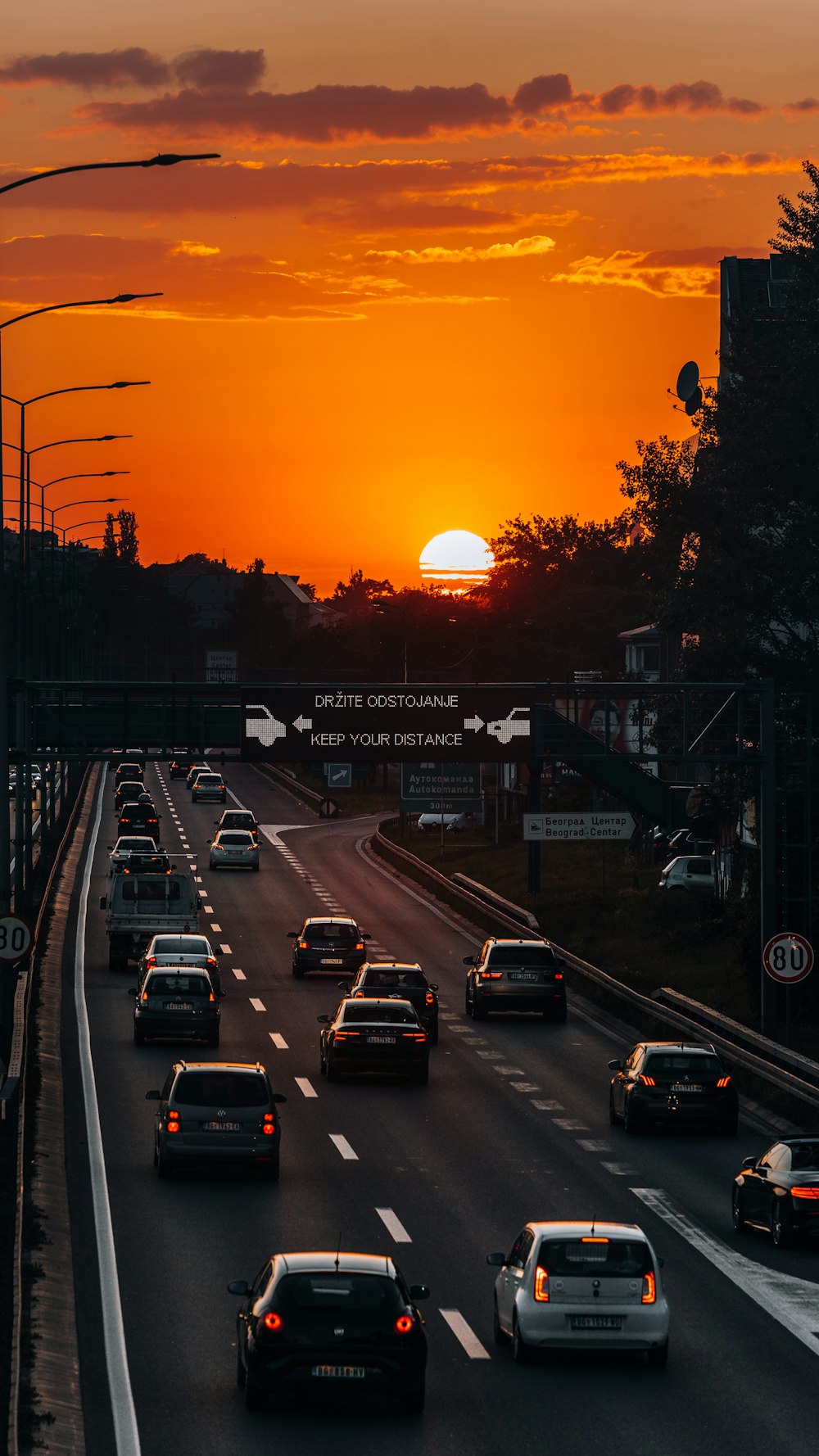 cars on road during sunset