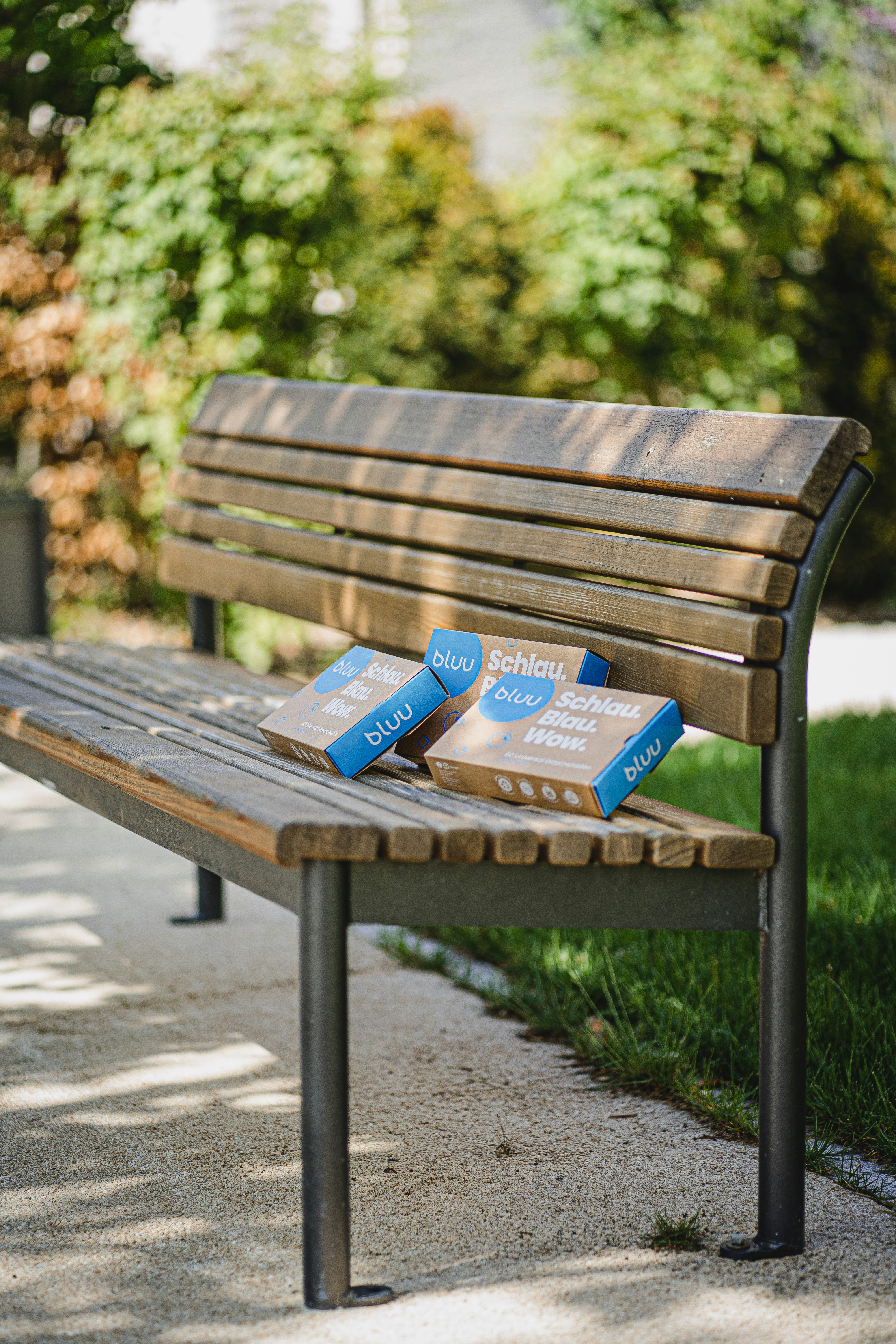 Blue and white labeled box on brown wooden bench photo – Free Furniture ...