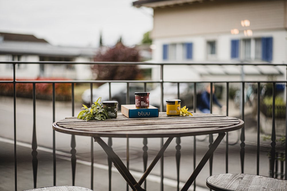 blue and yellow plastic container on gray table