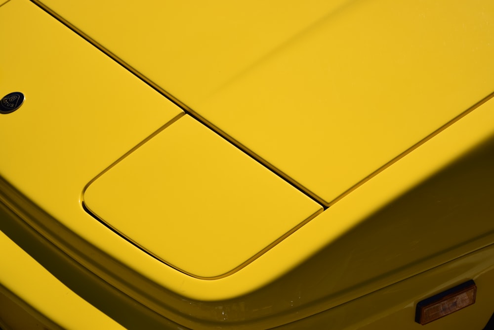 yellow and black plastic container